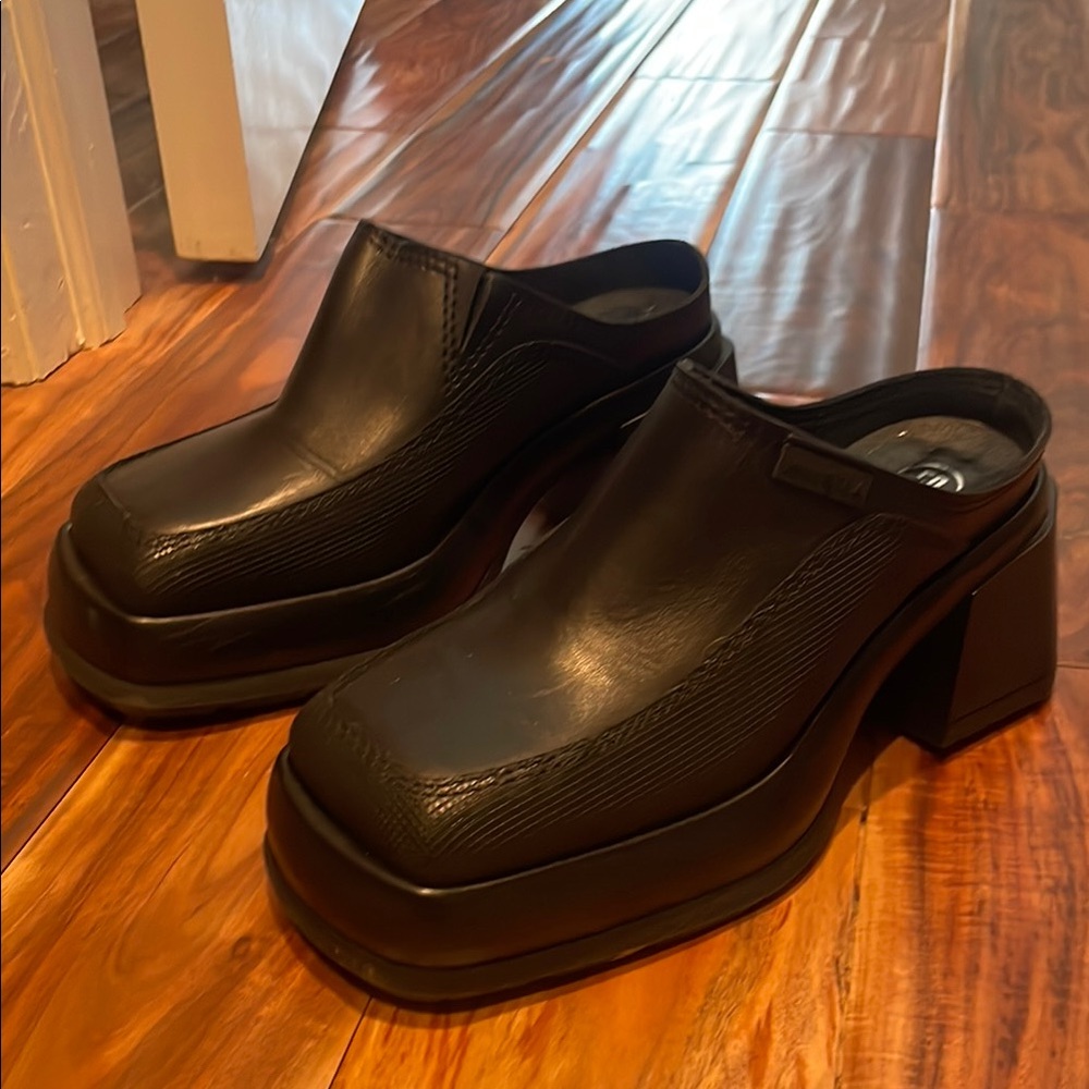 Black leather Miista Mule clogs